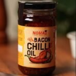 Nomad Food Project | Bacon Chilli Oil (180 gms) | Made with real Bacon | Garlicky, Umami, and Spicy | Perfect for momos, stir-fries, pizza, noodles, and more. - Fast UK Delivery - Image 3