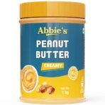 Abbie's Peanut Butter Creamy (1Kg-Pack of 1) with 26g Protein Per 100g Serving, Zero Trans Fat/Cholesterol, Keto Friendly,100% Vegan, Good Source of Fat for Athletes, Body Builders - Fast UK Delivery