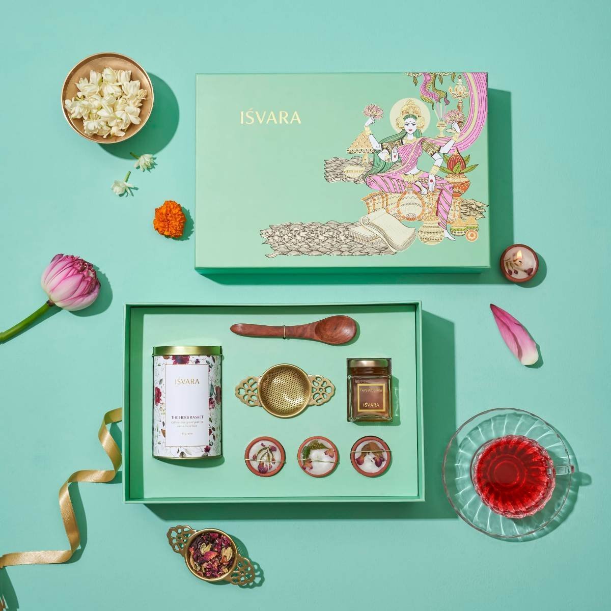 uk81PI1Ttz1zL-1.jpg ISVARA Tea Gifts - Goddess Lakshmi Gift Set, The Herb Basket tea box, forest honey, Floral petite candles and Sheesham wood spoon - Fast UK Delivery - Image 1