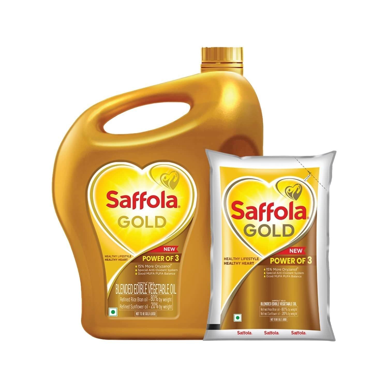 uk61v6mabVD9L-1-1.jpg Saffola Gold Refined Cooking oil | Blended of Rice Bran & Sunflower oil | 5 Litre Jar + Free 1 Litre Pouch - Fast UK Delivery - Image 1